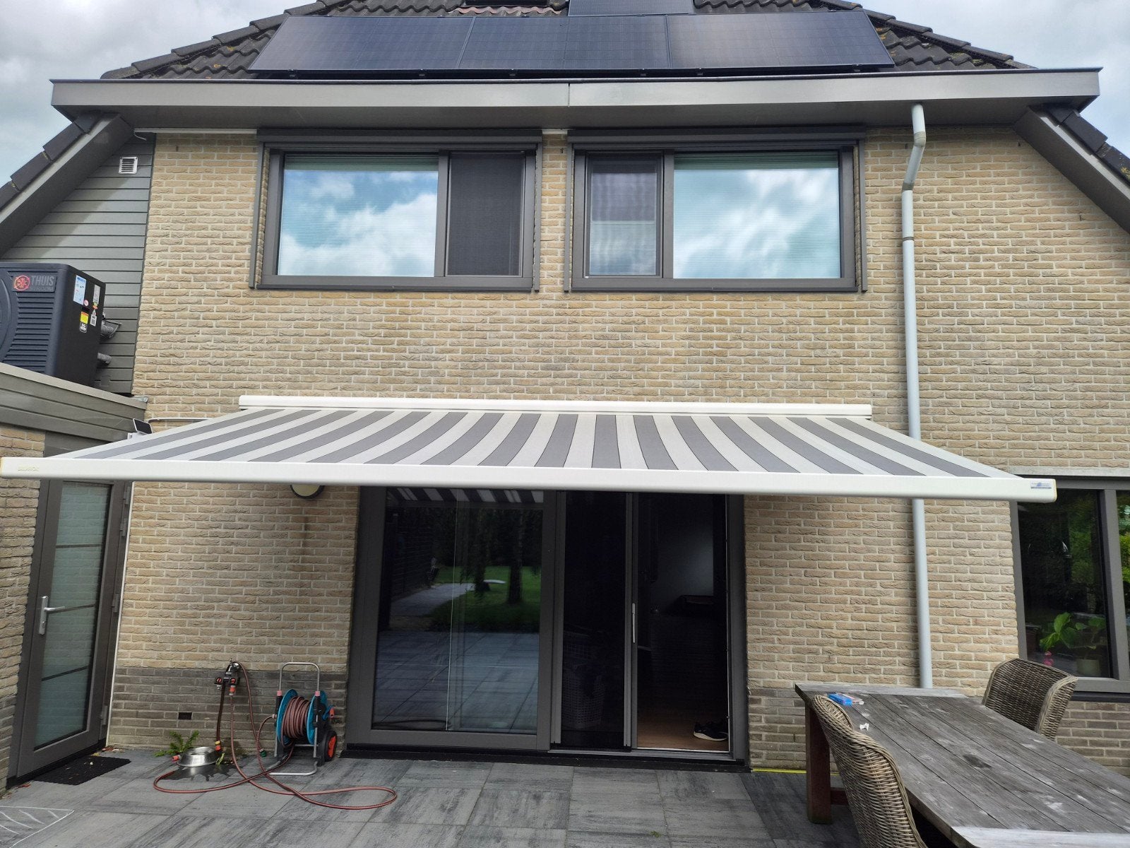 Brustor terrasscherm 5m breed, 2.50m uitval met Somfy motor, Ophalen, 450 cm of meer, Elektrisch, Zo goed als nieuw