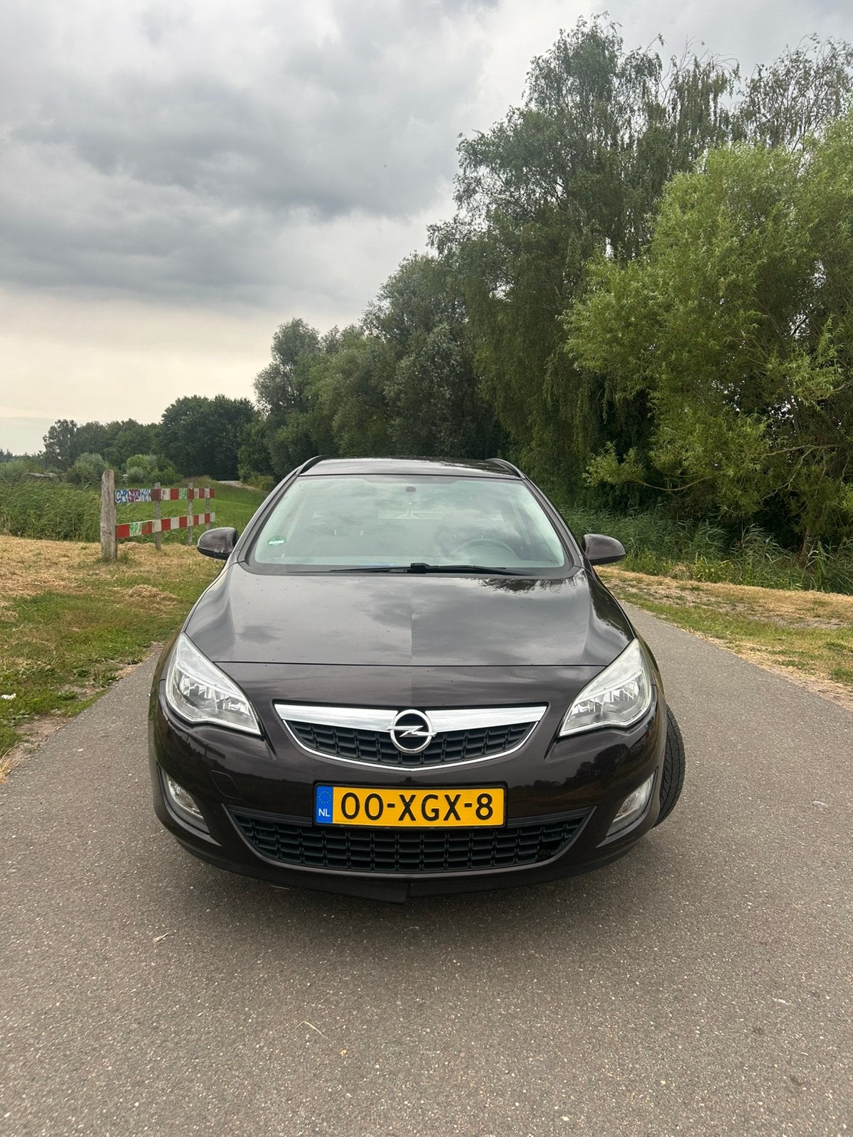 Opel Astra sports tourer 1.4 eco flex 74KW ST 2012 Bruin, Auto's, Voorwielaandrijving, Euro 5, 4 cilinders, Bruin