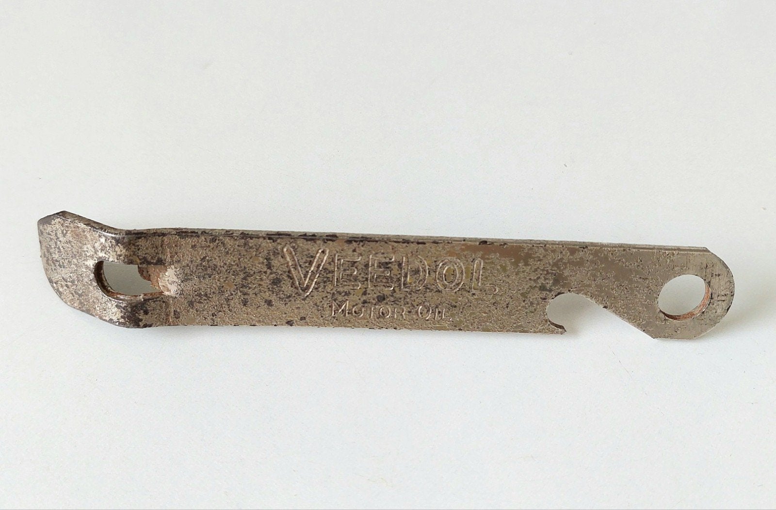 Oude Easy can and bottle opener met reclame voor Veedol moto, Ophalen of Verzenden, Gebruikt