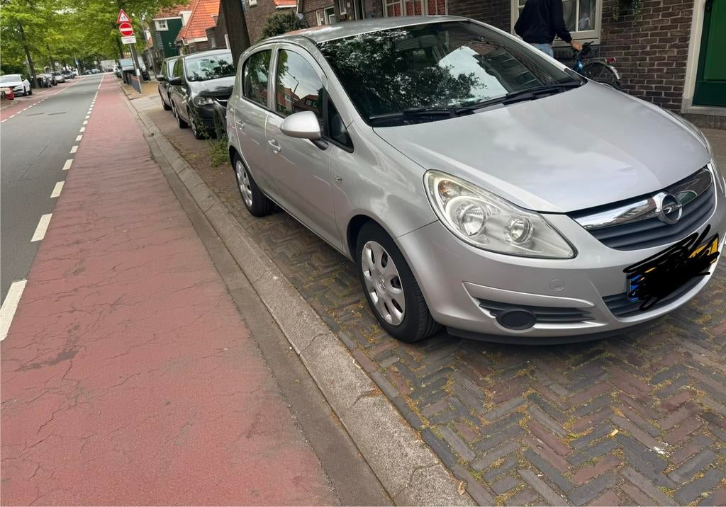 Opel Corsa 1.2 16V 5D 2009 Grijs, Auto's, Opel, Voorwielaandrijving, 4 cilinders, 1229 cc, 49 €/maand