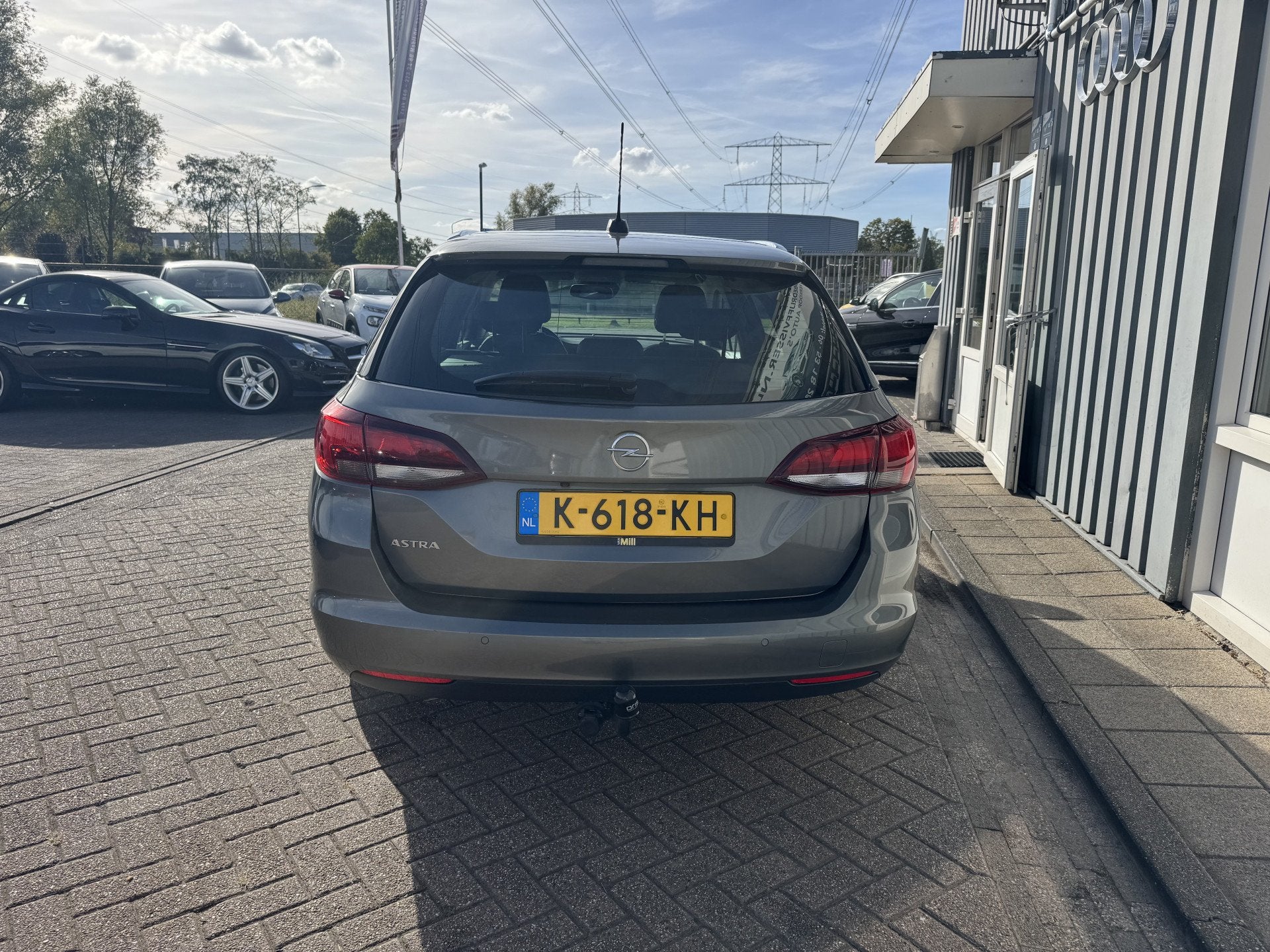 Opel Astra Sports Tourer 1.2 Business Elegance (bj 2021), Auto's, Voorwielaandrijving, 1199 cc, Leder en Stof, Origineel Nederlands
