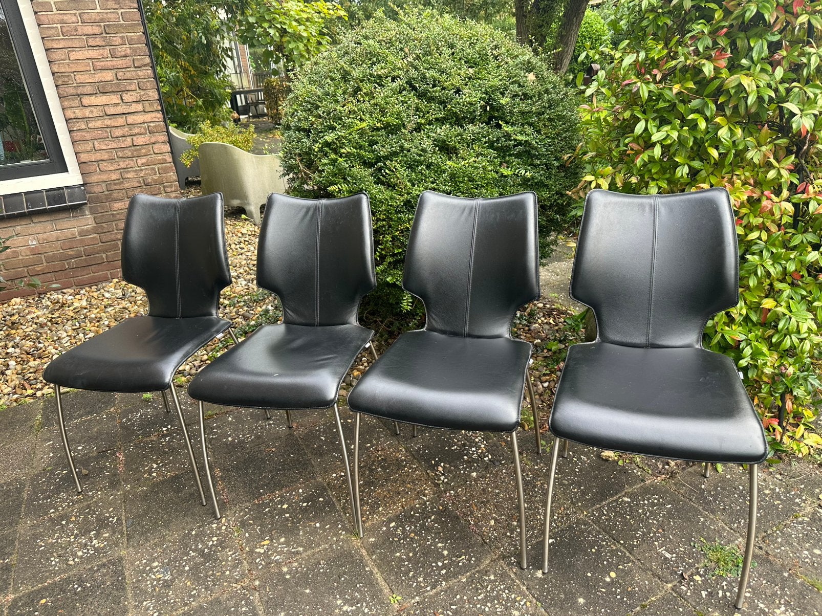 4 design zwartleren eetkamerstoelen van Bree’s New World., Ophalen, Zwart, Leer, Zo goed als nieuw