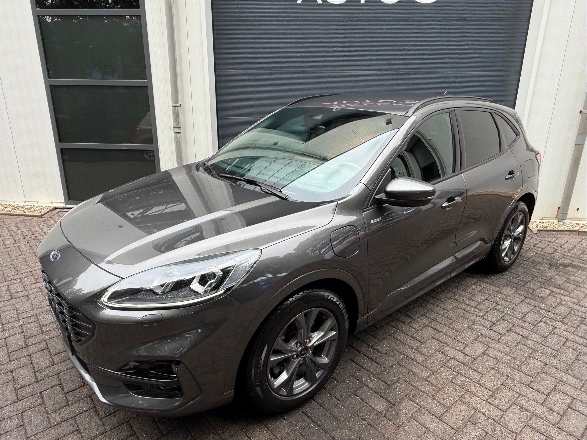 Ford Kuga 2.5 PHEV ST-Line X 224 Pk Cruise/Climate/Leder/Alc, Auto's, Ford, Gebruikt, Zwart, 4 cilinders, Origineel Nederlands