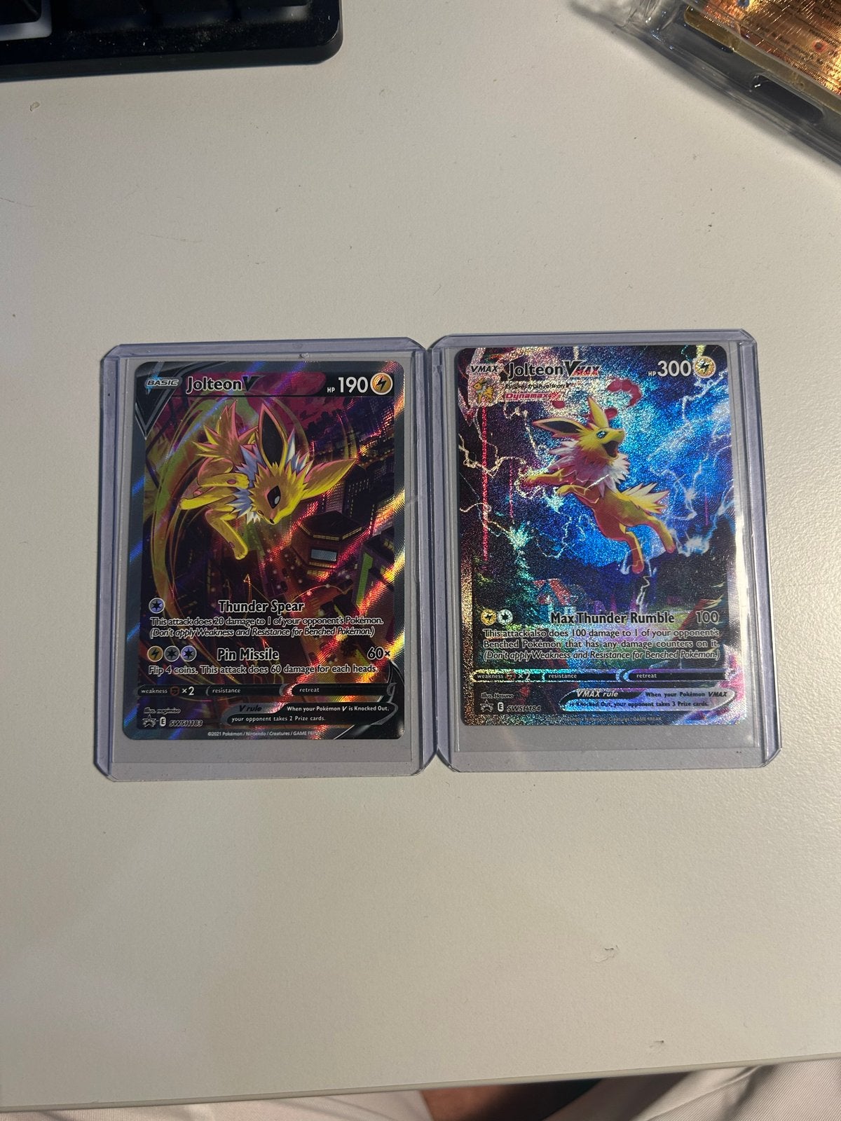 Pokémon TCG Jolteon VMAX Premium Collection promo kaarten, Ophalen of Verzenden, Zo goed als nieuw, Meerdere kaarten, Foil