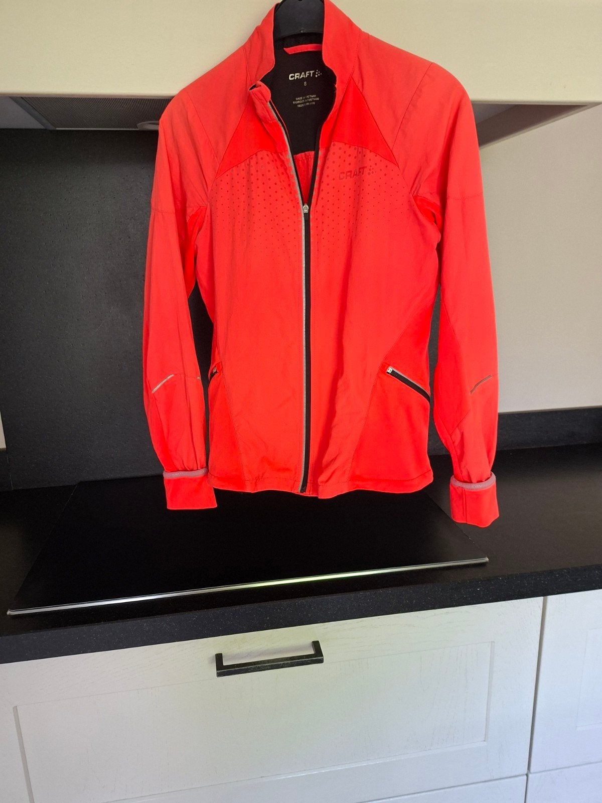 Craft hardloopjack - Oranje, Kleding | Dames, Sportkleding, Verzenden, Oranje, Zo goed als nieuw, Maat 36 (S)