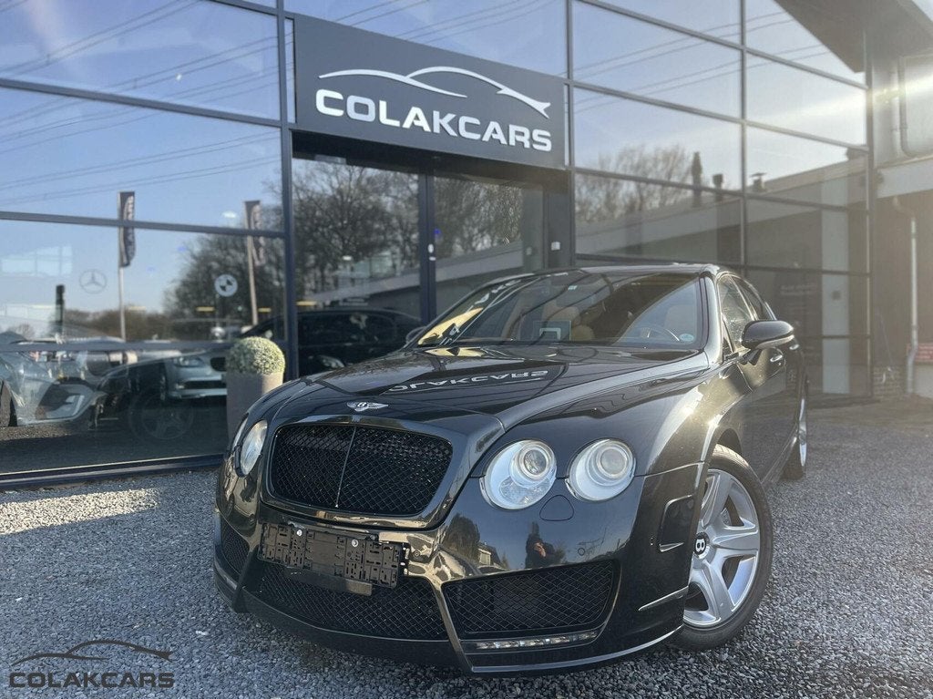 Bentley Continental 6.0 W12 Mansory Garantie nieuw !, Gebruikt, 12 cilinders, Zwart, Leder