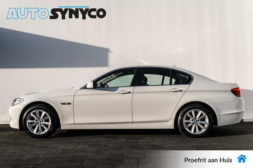 BMW 5 Serie 520i | Trekhaak | Climatronic | Cruise | Navigat, Euro 5, Gebruikt, Zwart, 4 cilinders