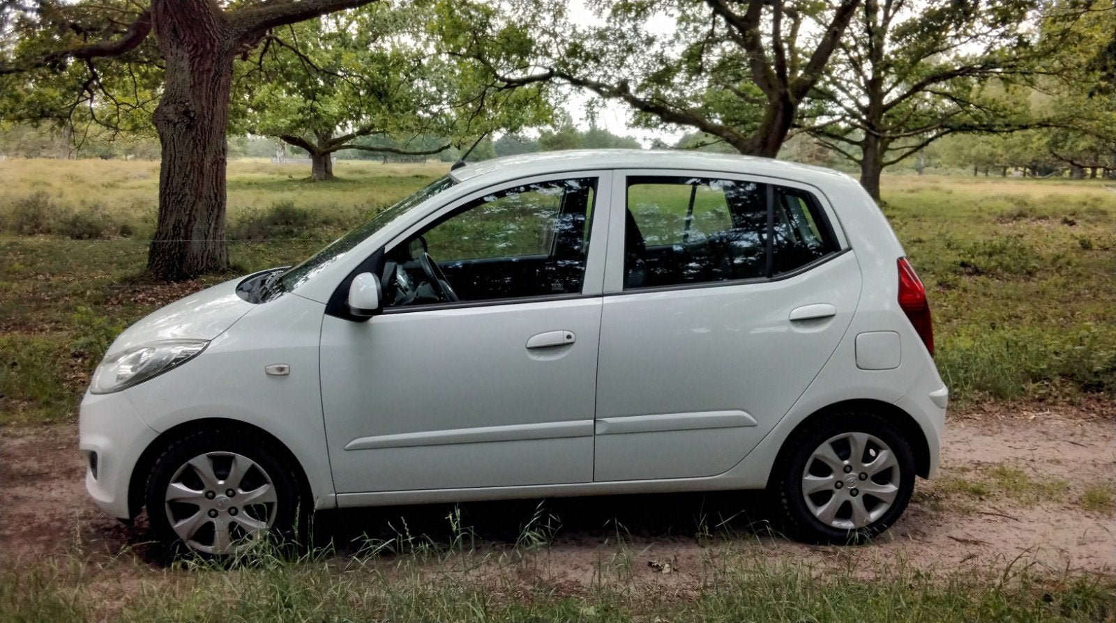 Hyundai i10 1.25 I 5DR 2011 Wit, Auto's, Hyundai, Euro 5, 4 cilinders, Wit, Origineel Nederlands