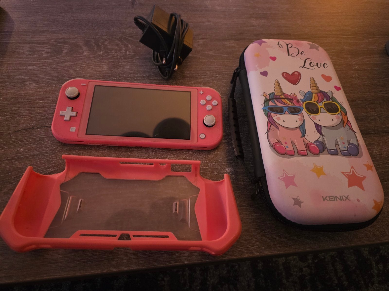 Roze Nintendo Switch Lite met hoes en beschermhoes, Ophalen of Verzenden, Zo goed als nieuw, Zonder controller, Switch Original