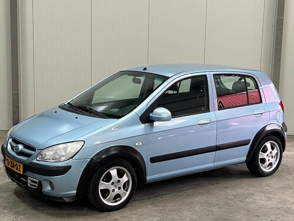 Hyundai Getz 1.4 Dynamic Sport/Airco/Trekhaak, Voorwielaandrijving, Elektrische ramen, 40 €/maand, Zwart