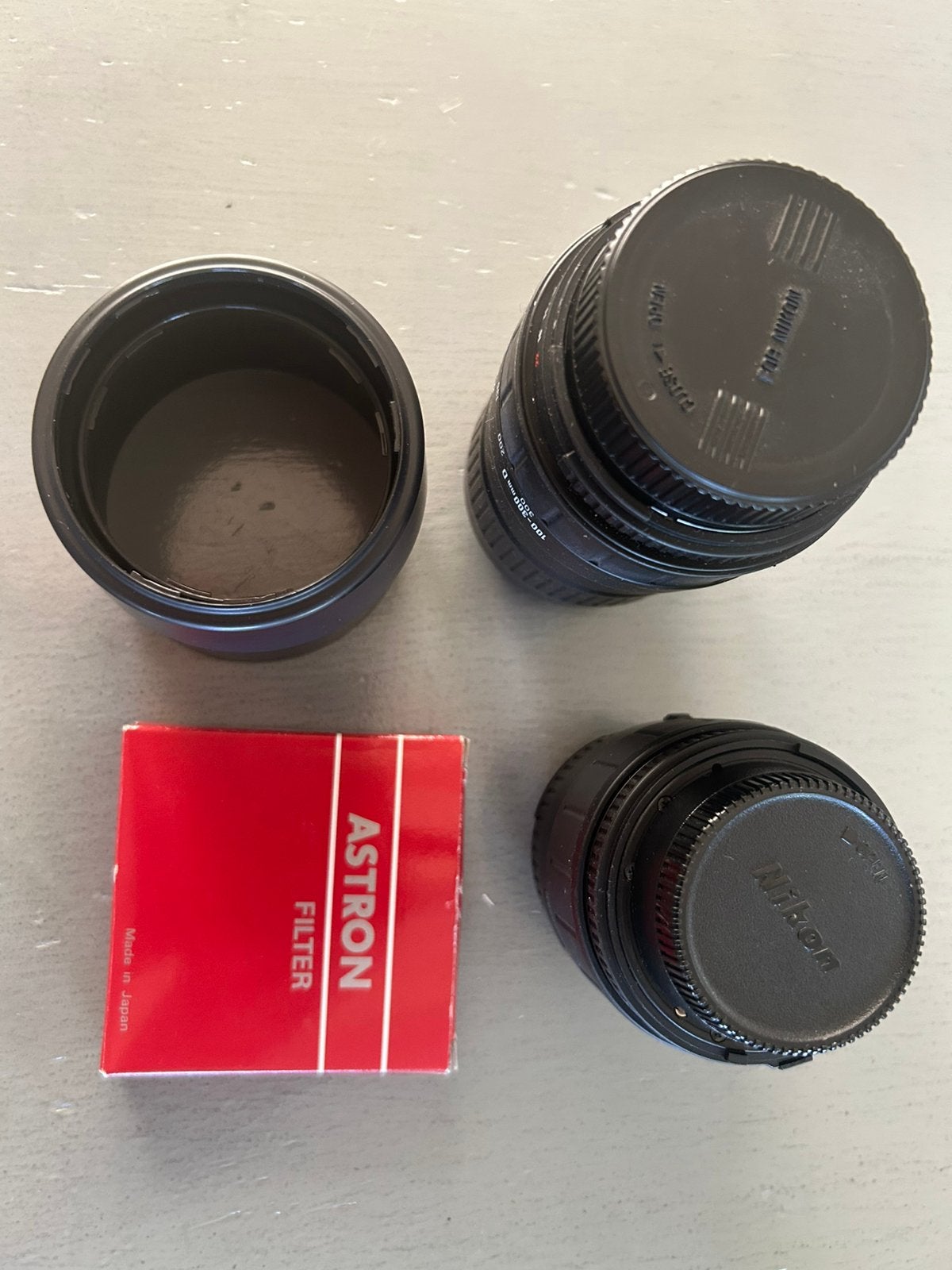 Sigma zoomlens. z.g.a.n. 2 zoomlenzen + zonnekap + filter, Ophalen of Verzenden, 1980 tot heden, Lens of Lenzen