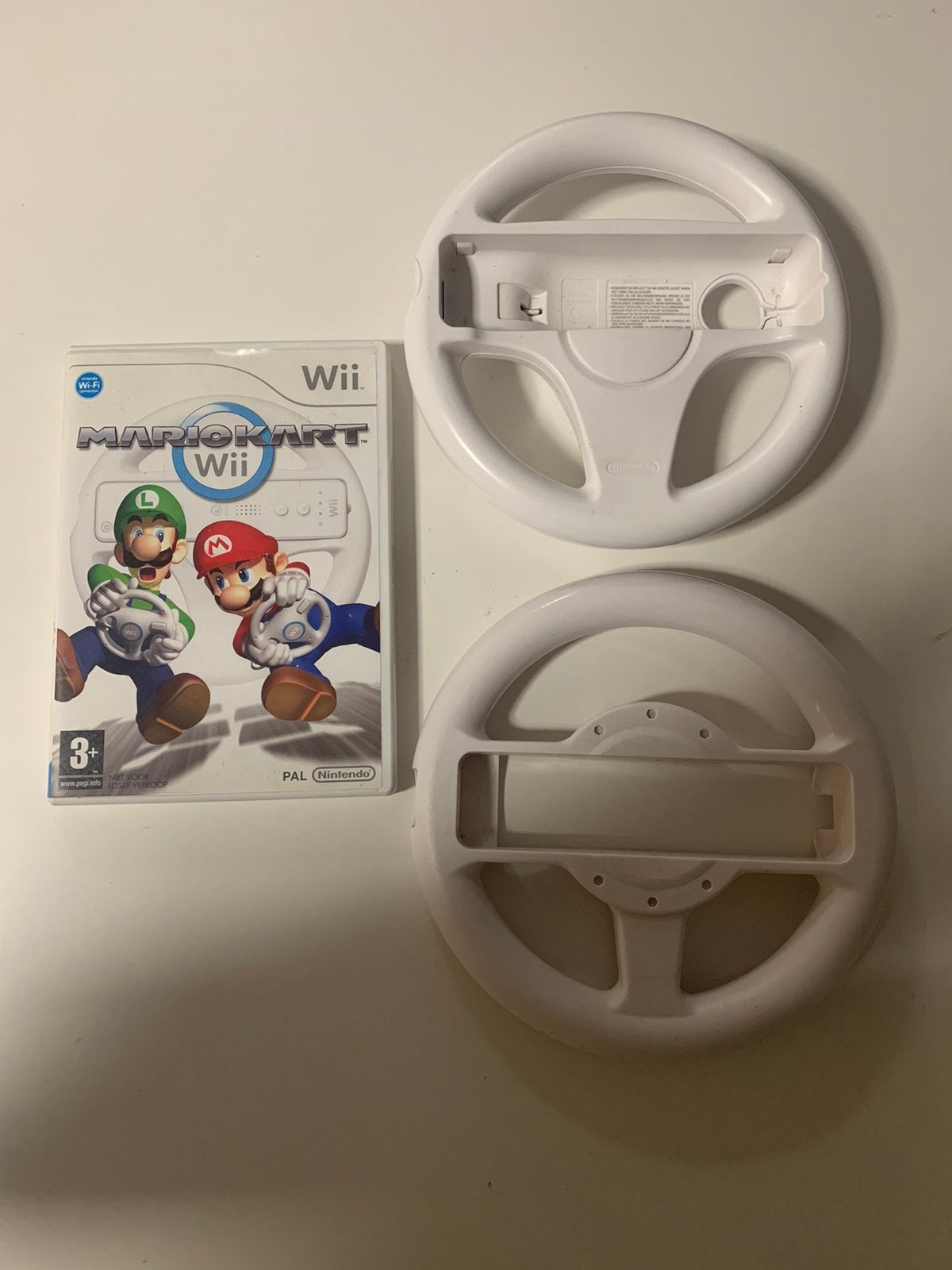 Mario Kart Wii + 2 Stuurtjes | Nintendo Wii, Spelcomputers en Games, Racen en Vliegen, Ophalen of Verzenden, Zo goed als nieuw