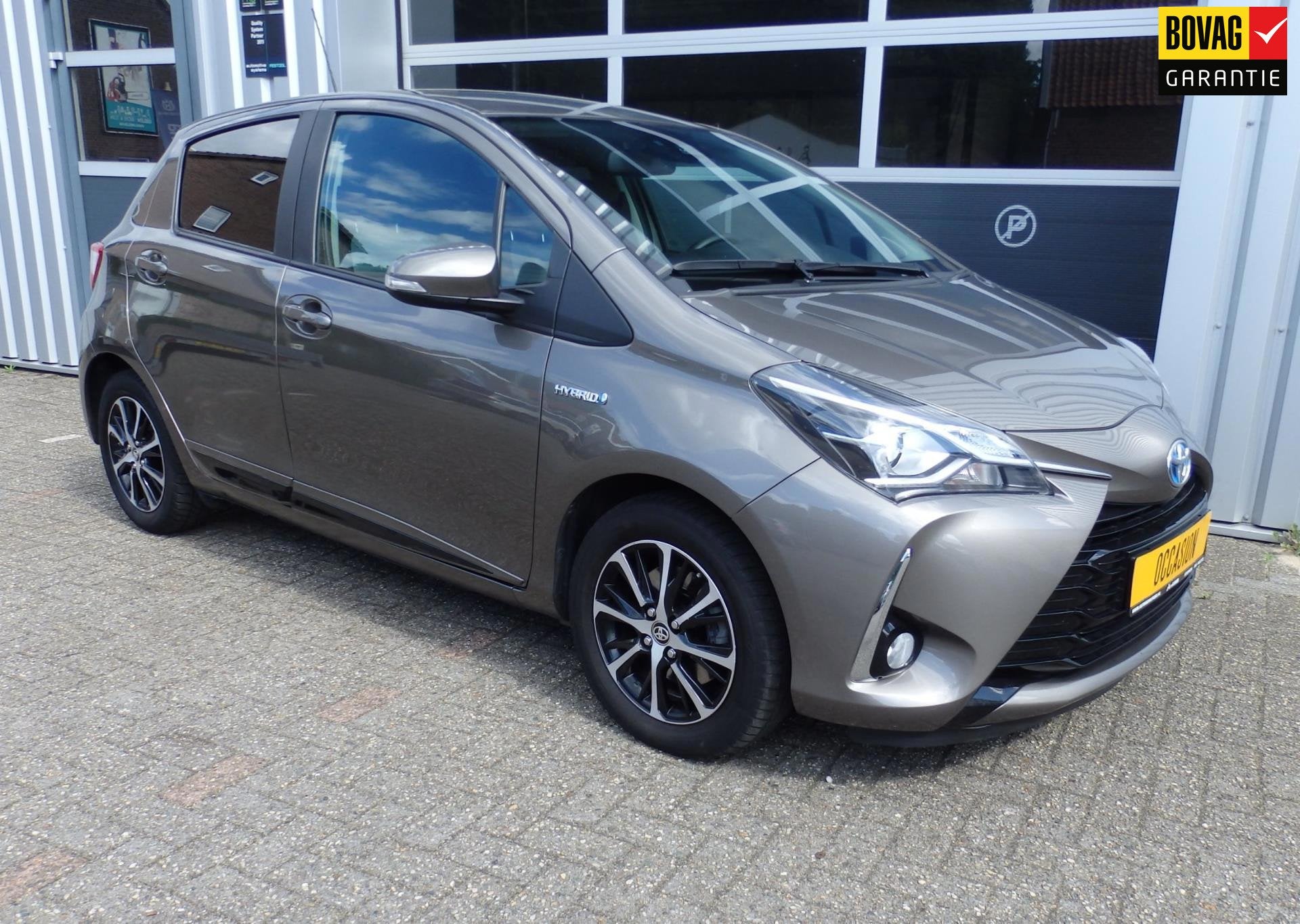Toyota Yaris 1.5 Hybrid Comfort | Navi | PDC | Fietsdrager t, 12 maanden, 61 pk, Bedrijf, Grijs