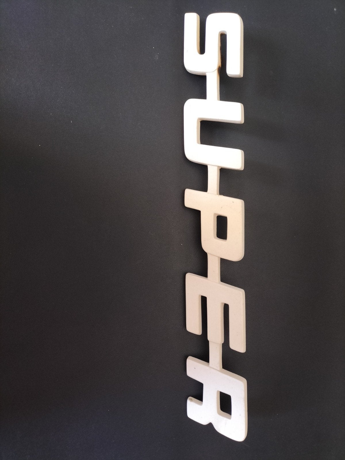 embleem "SUPER" 43x7 cm, Ophalen