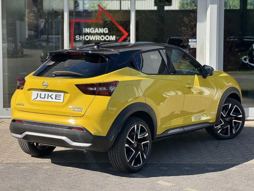 NISSAN Juke Hybrid 143pk N-Design | NIEUW | Navigatie | App, Auto's, Nissan, Automaat, Stof, Zwart, Geel