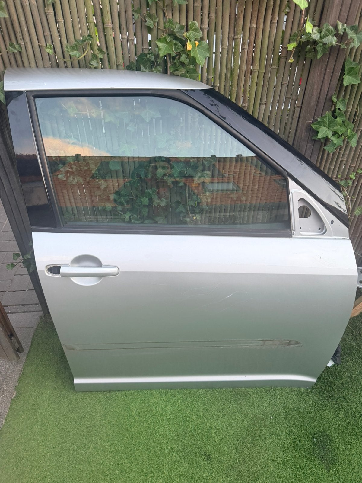 Suzuki swift deur 2005/2010 grijs/zilver, Auto-onderdelen, Ophalen of Verzenden, Suzuki, Deur