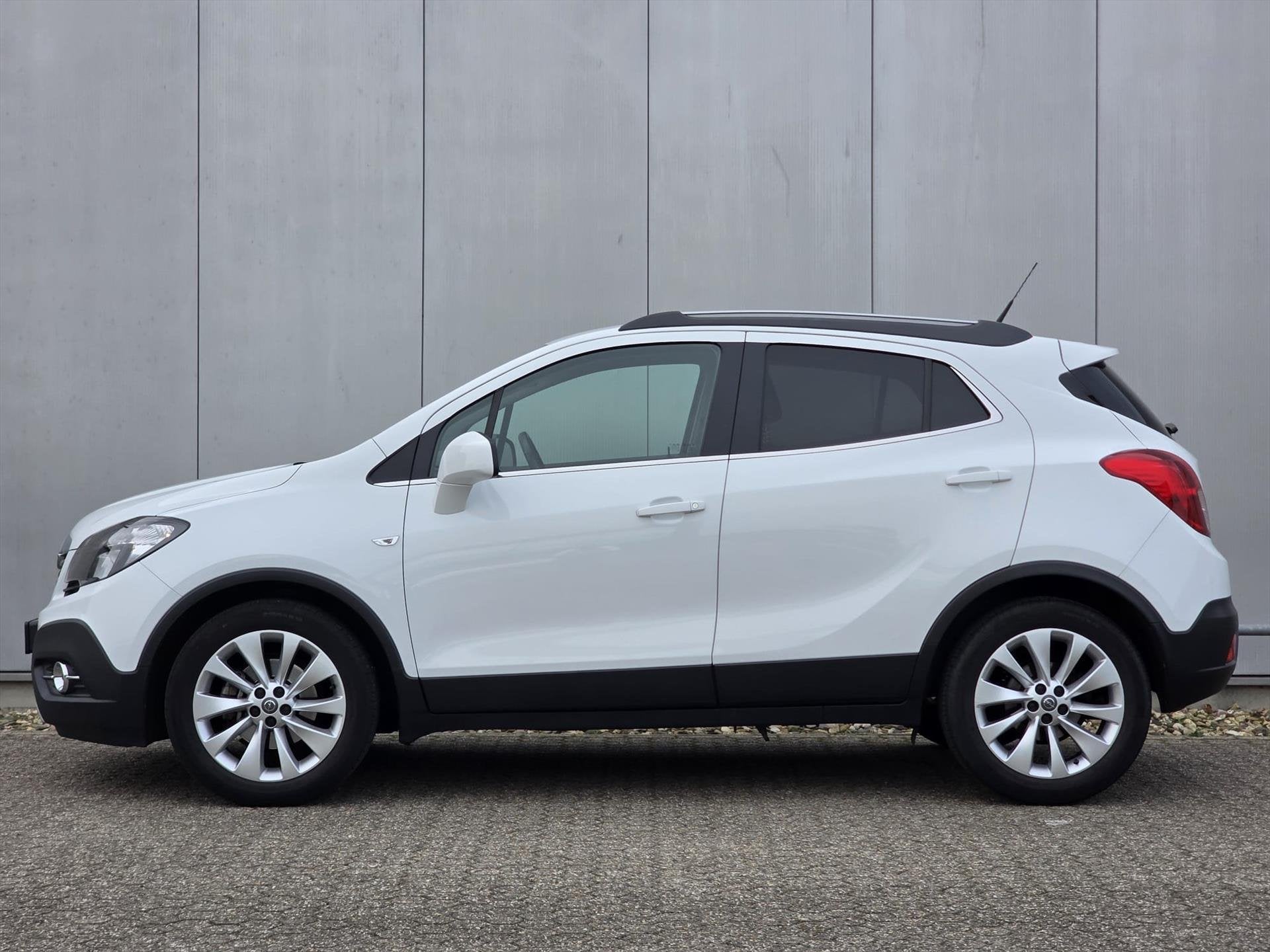 Opel Mokka 1.4 140PK Cosmo | Navigatie | Parkeercamera | Cli, Auto's, Voorwielaandrijving, Euro 5, Stof, Gebruikt