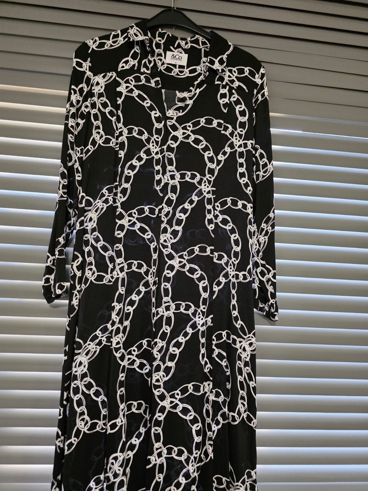 Zwarte blousejurk met kettingprint van &CO Woman, Maat 38/40 (M), Zwart, Ophalen of Verzenden, Zo goed als nieuw