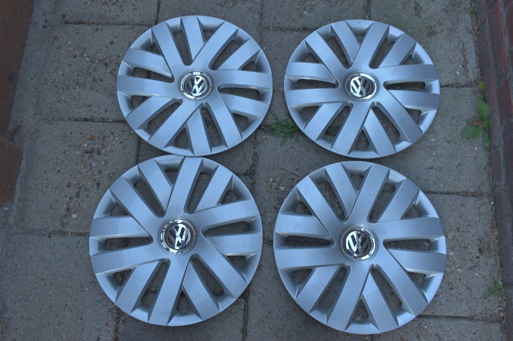 Set van 4 originele wieldoppen Volkswagen Polo 15 inch, Ophalen of Verzenden, Gebruikt