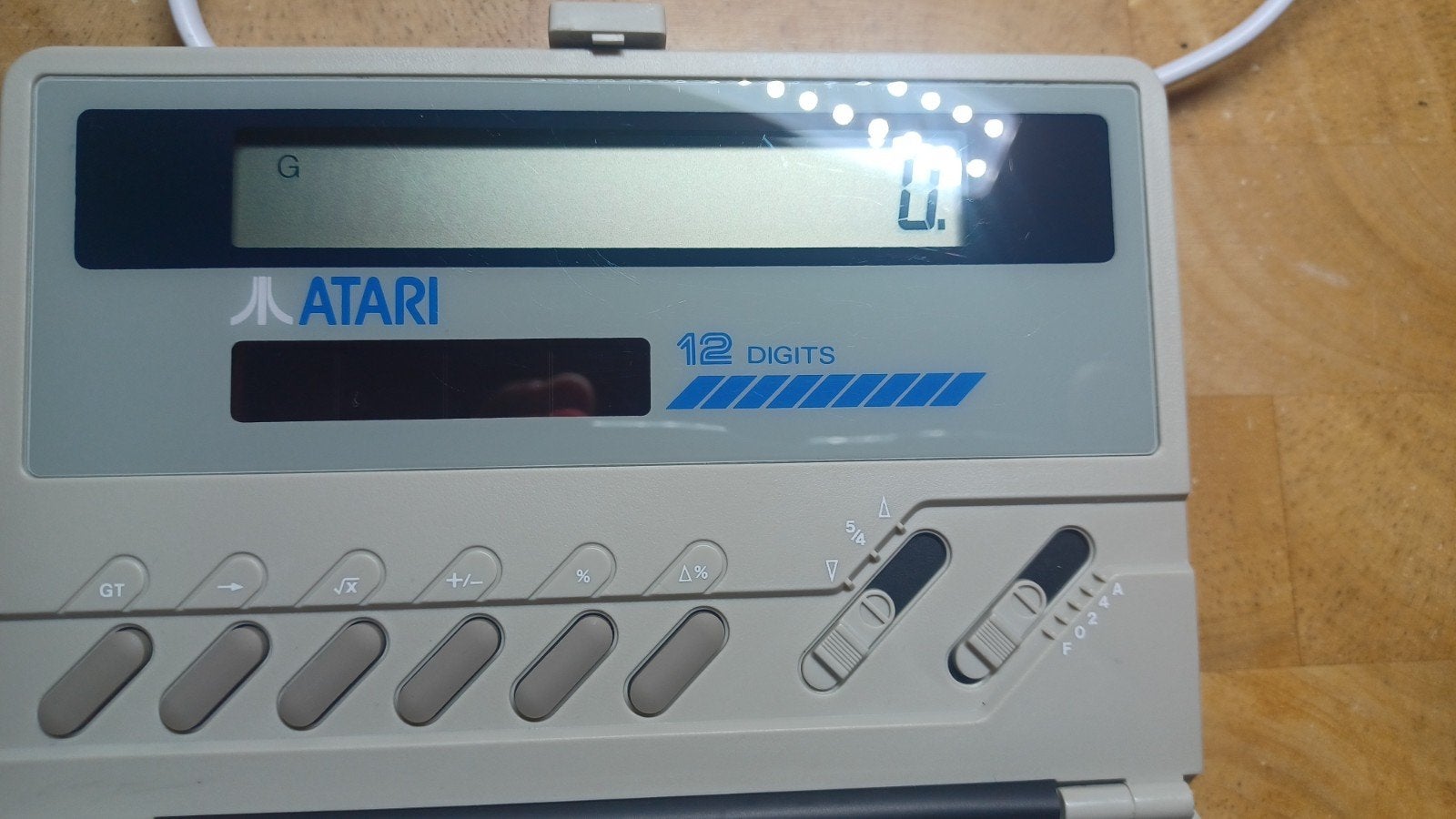 Atari rekenmachine cc1200, Spelcomputers en Games, Games | Atari, Ophalen, 1 speler, Racen en Vliegen, Zo goed als nieuw