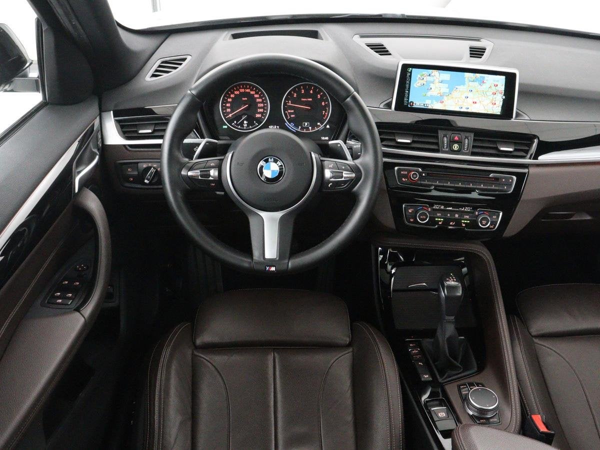 BMW X1 xDrive20i Centennial High Executive | Panoramadak | P, Auto's, 1998 cc, Gebruikt, 2000 kg, Wit