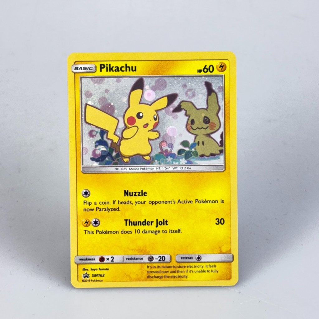 TCG Pikachu SM162 Excellent / Good in Toploader, Zo goed als nieuw