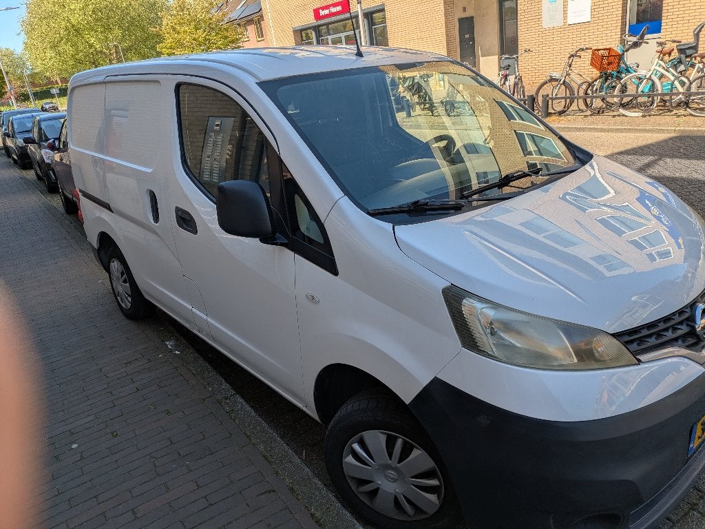 Nissan Nv200 1.5 D 63KW 2010, Auto's, Voorwielaandrijving, Zwart, Wit, Origineel Nederlands