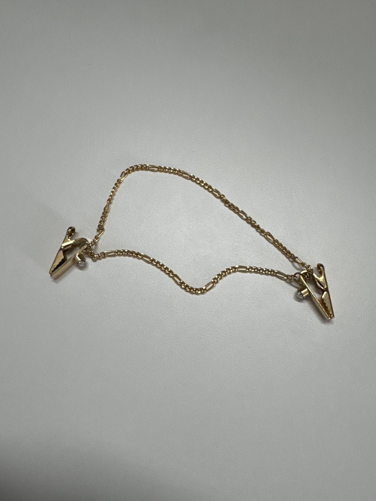 Goudkleurige  ketting met clips, Ophalen of Verzenden, Zo goed als nieuw