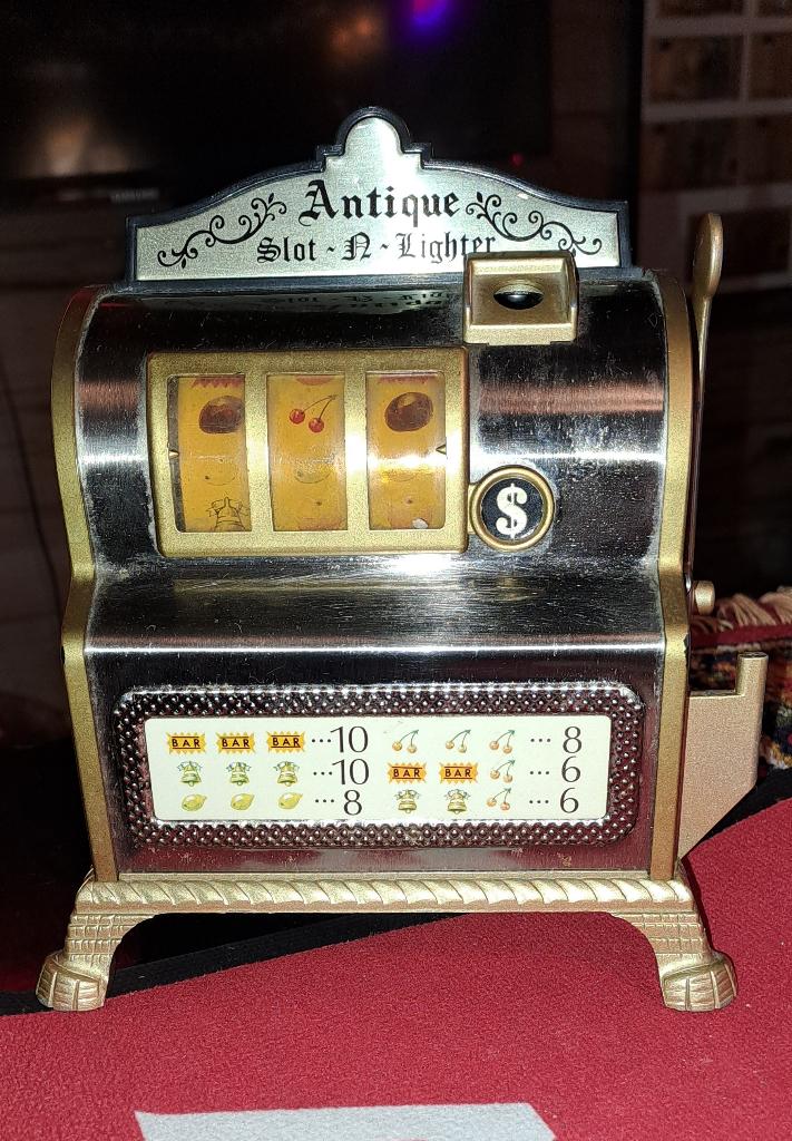 éénarmige bandietje met aansteker, Verzamelen, Antique slot & lighter, Japan, WACO, Ophalen of Verzenden