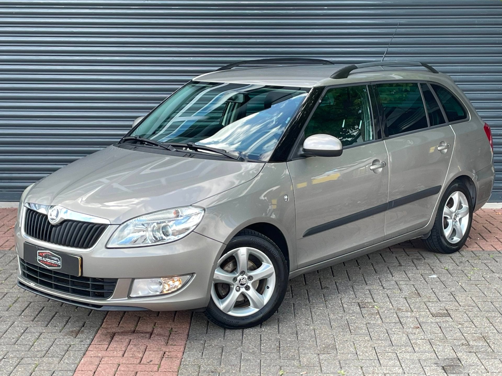 Skoda Fabia Combi 1.2 TSI Elegance Trekhaak | Pdc | Cruise |, Voorwielaandrijving, Euro 5, Zwart, 4 cilinders