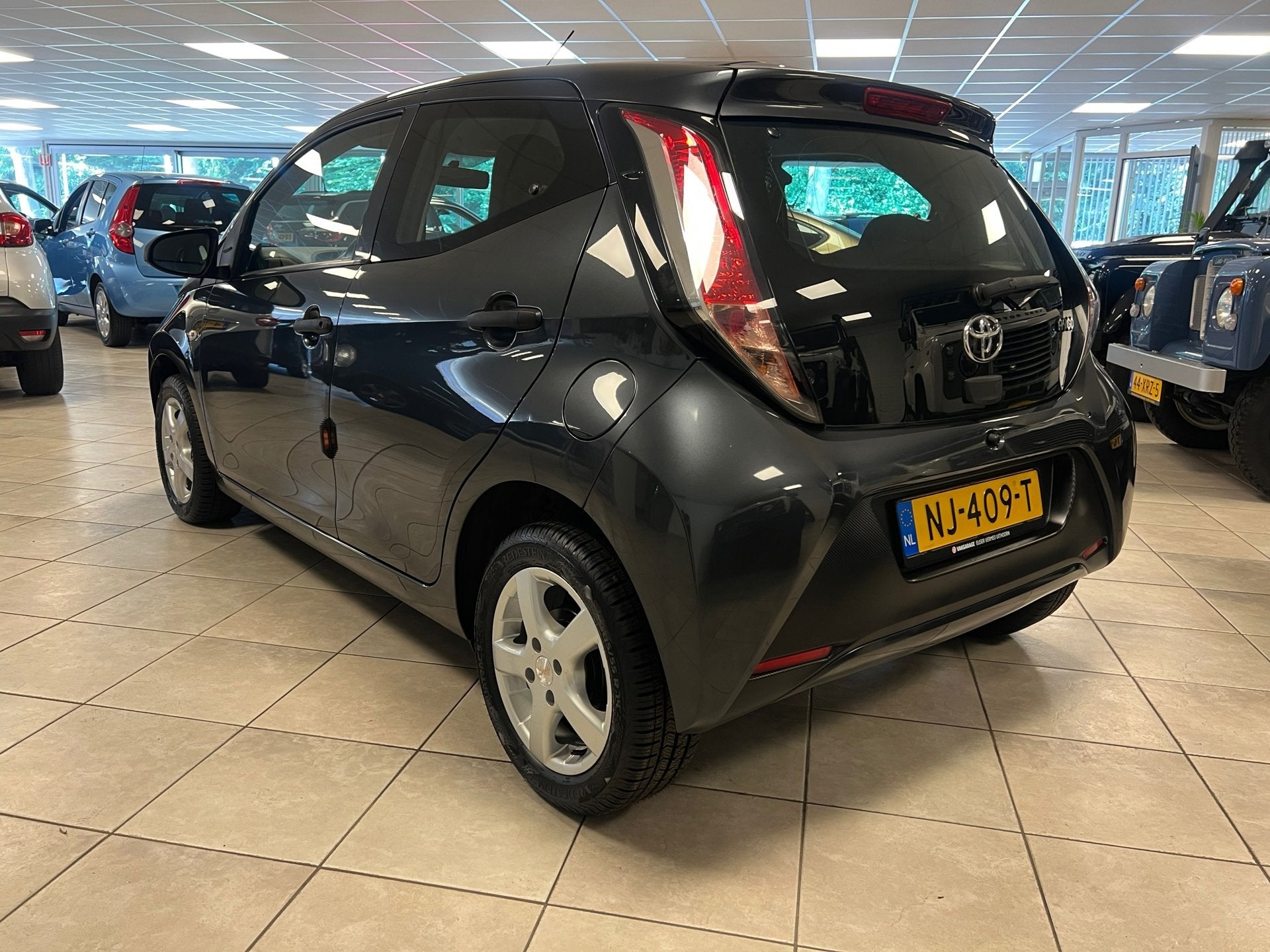 Toyota Aygo 1.0 VVT-i x-fun Airco, Cruise control., Voorwielaandrijving, Stof, Gebruikt, 4 stoelen
