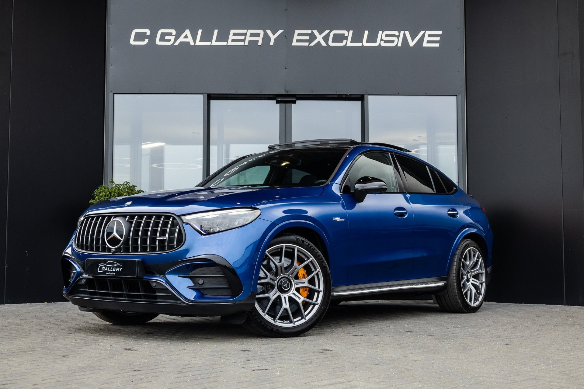 Mercedes-Benz GLC Coupé AMG GLC63 S E Performance Night Edi, Auto's, Dealer onderhouden, Gebruikt, Zwart, Blauw