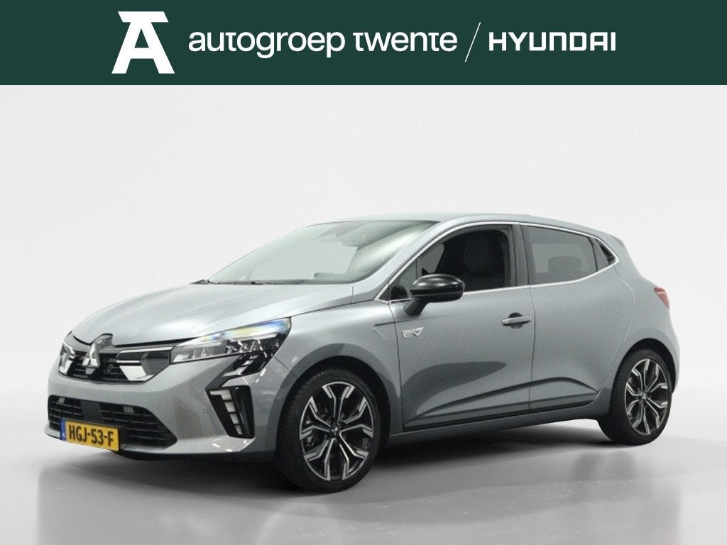 Mitsubishi Colt 1.6 HEV Intense+ | All season | Navigatie |, Auto's, Gebruikt, 4 cilinders, Leder en Stof, Colt