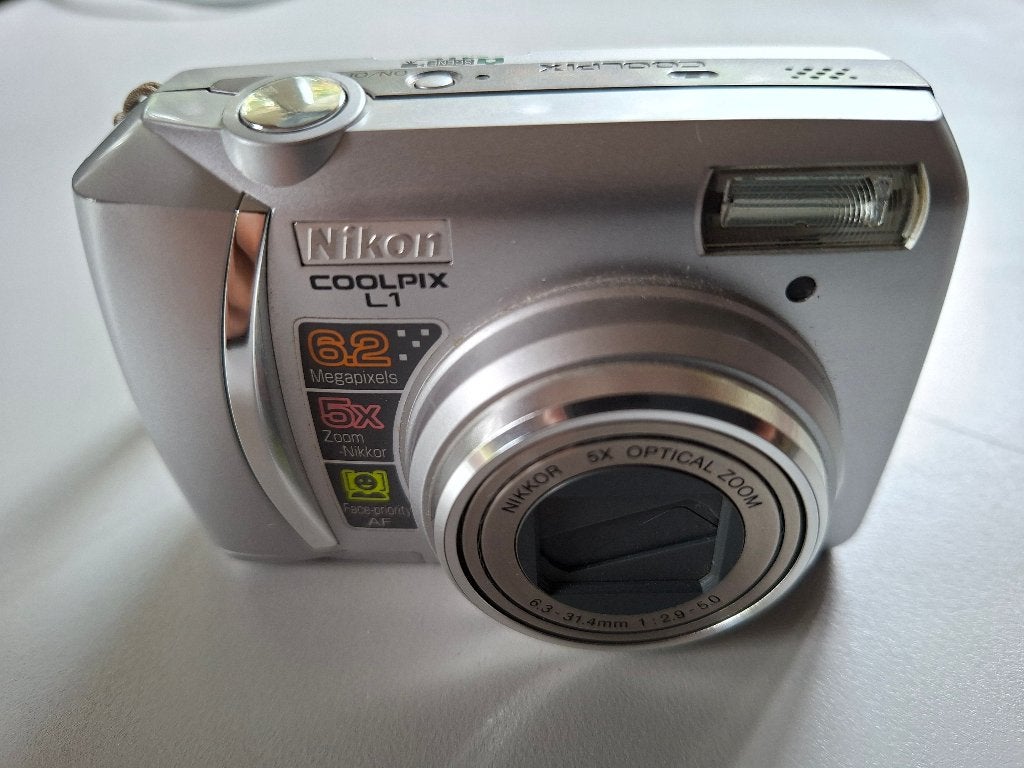 Nikon Coolpix L1, voor foto en video, Ingebouwde flitser, Gebruikt, Ophalen of Verzenden, Compactcamera