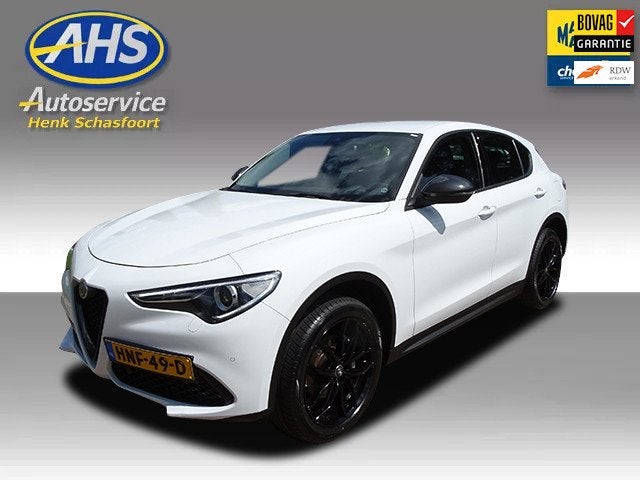 Alfa Romeo STELVIO 2.0 T AWD Super, Auto's, Automaat, Automatische klimaatregeling, Leder en Stof, Wit