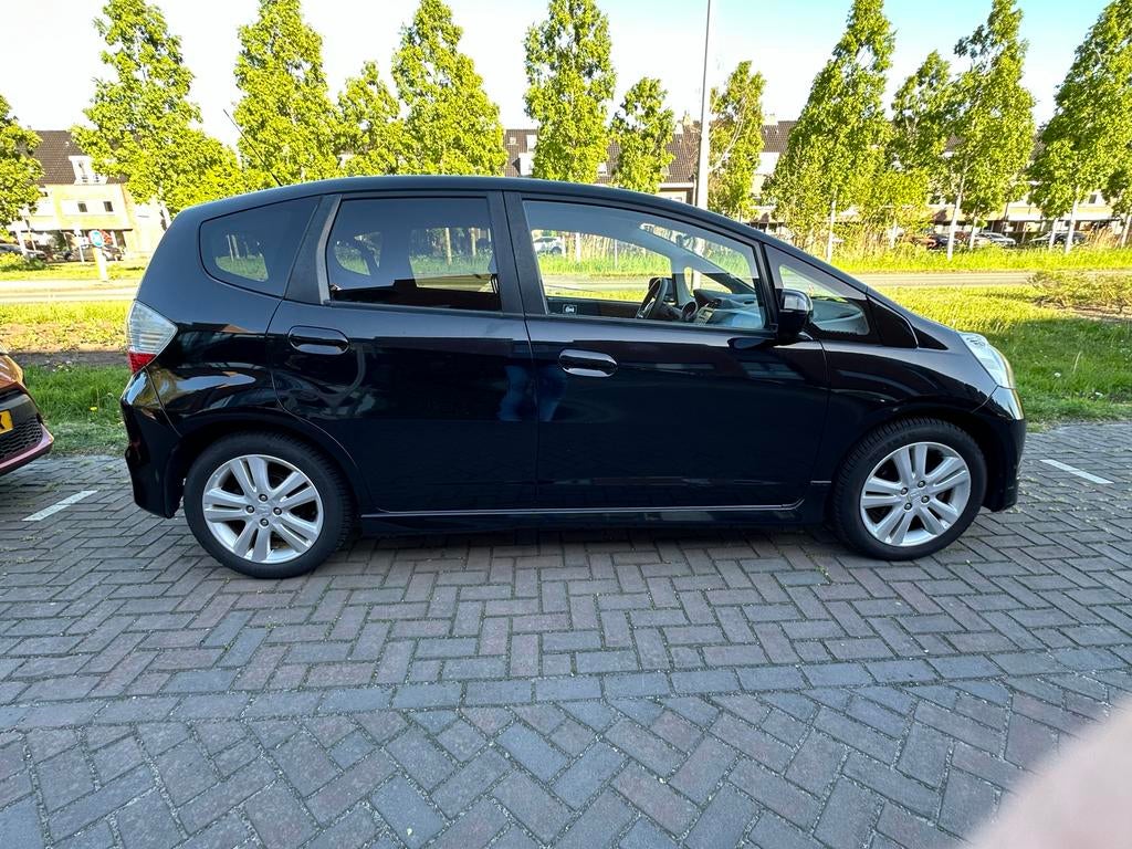Zeer goede Honda Jazz 1.4 2009 zwart, luxe uitvoering, Voorwielaandrijving, 1046 kg, 40 €/maand, Zwart
