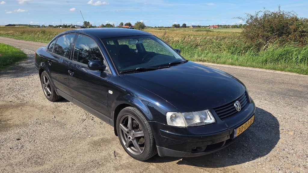 Volkswagen Passat 2.8 Syncro 142KW 1999 Blauw, Auto's, Euro 2, Stof, 1800 kg, Zwart