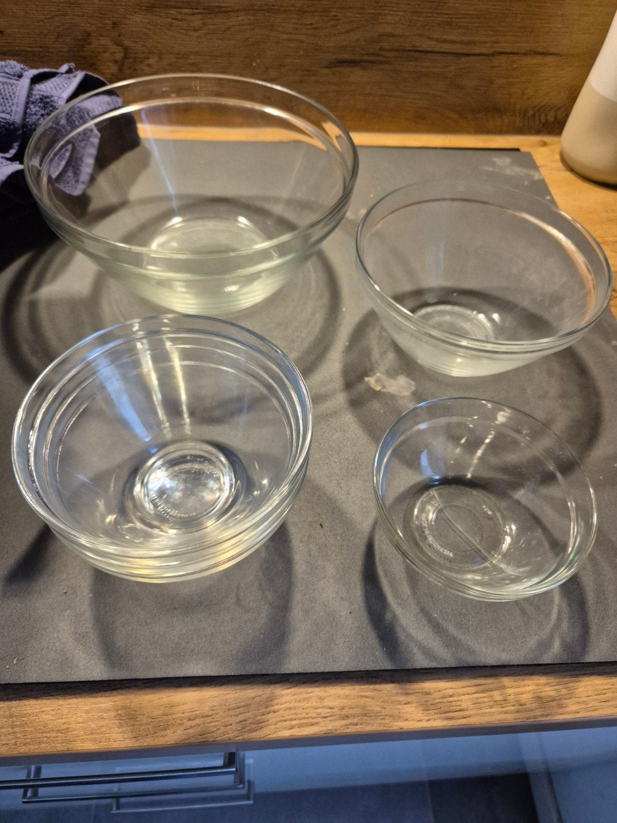 Set van 4 glazen kommen in verschillende maten, Huis en Inrichting, Ophalen, Gebruikt, Glas, Kom(men)