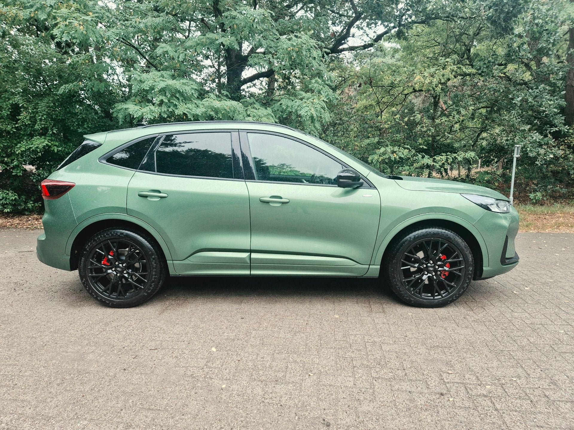 Ford Kuga 2.5 FHEV ST-Line X Black Pack geen stekker, Auto's, Dealer onderhouden, Zwart, 1589 kg, Bedrijf