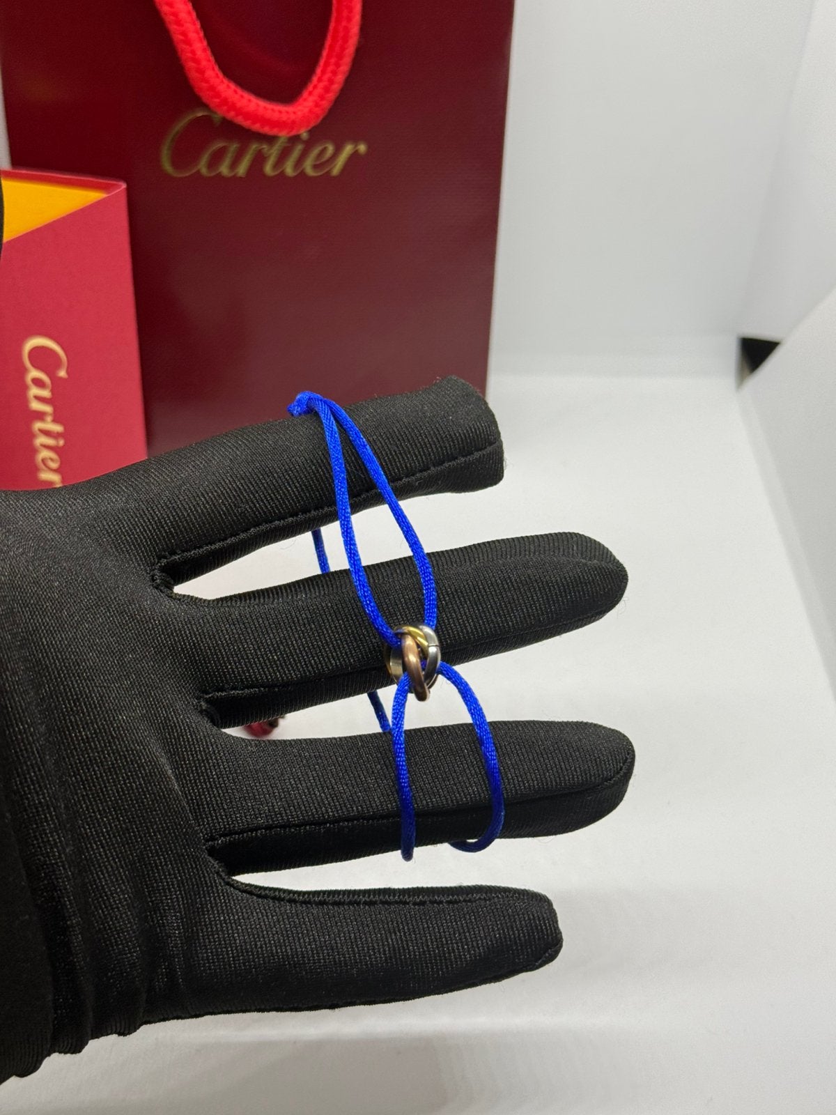 CARTIER TRINITY BLAUWE ARMBAND, Ophalen of Verzenden, Zo goed als nieuw, Blauw