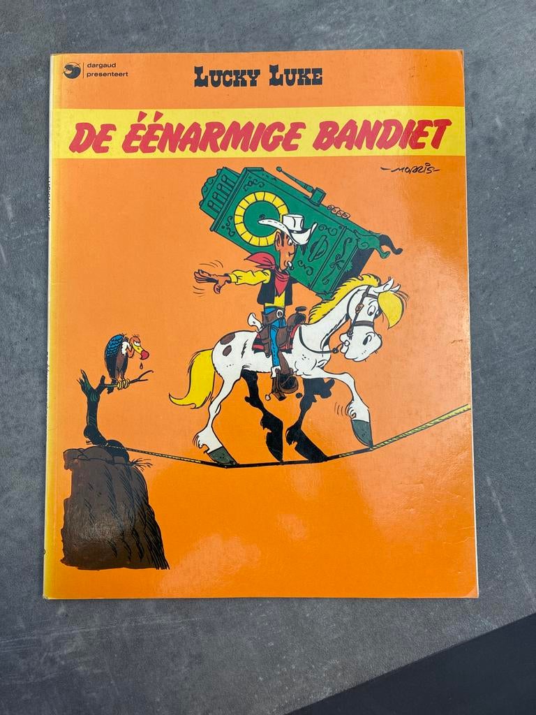 Lucky Luke - De Eénarmige Bandiet (Dargaud), Boeken, Stripboeken, Eén stripboek, Ophalen of Verzenden, Zo goed als nieuw