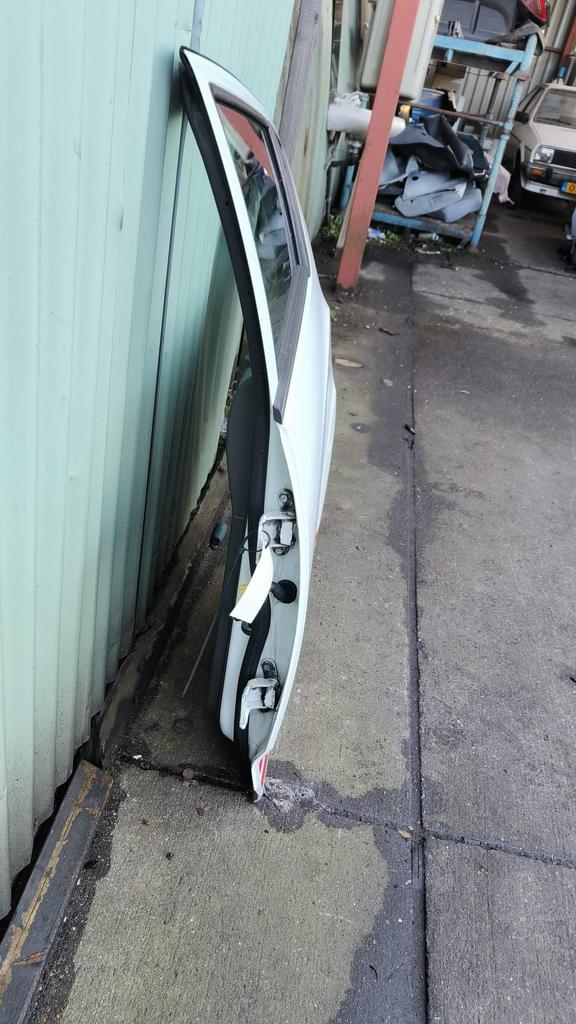Linker Portier Chevrolet Spark bouwjaar 2011., Gebruikt, Deur, -, Ophalen of Verzenden