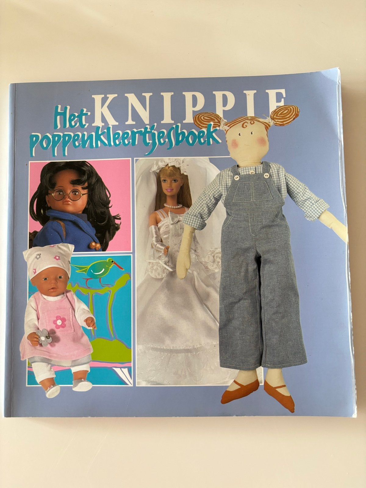 Het Knippie Poppenkleertjesboek Patronen voor poppenkleding, Ophalen of Verzenden, Nieuw, Overige typen