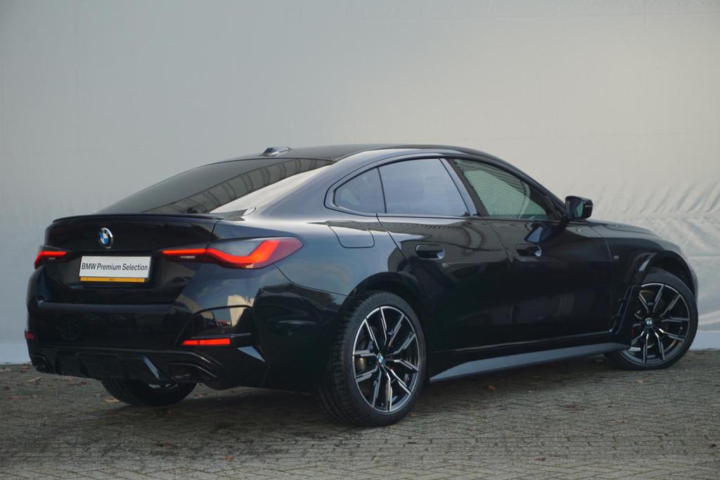BMW 4 Serie Gran Coupé M440i xDrive M Sportpakket Pro 19'', Auto's, BMW, Met garantie (alle), Zwart, 374 pk, Bedrijf