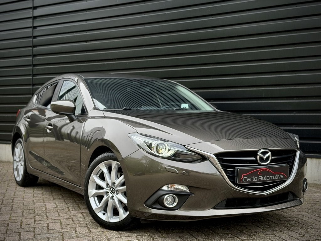 Mazda 3 2.0 TS+ HUD|DODEHOEK|BOSE|STOELVERW|NAVI|XENON, Auto's, Mazda, Gebruikt, 4 cilinders, Bruin, Bedrijf
