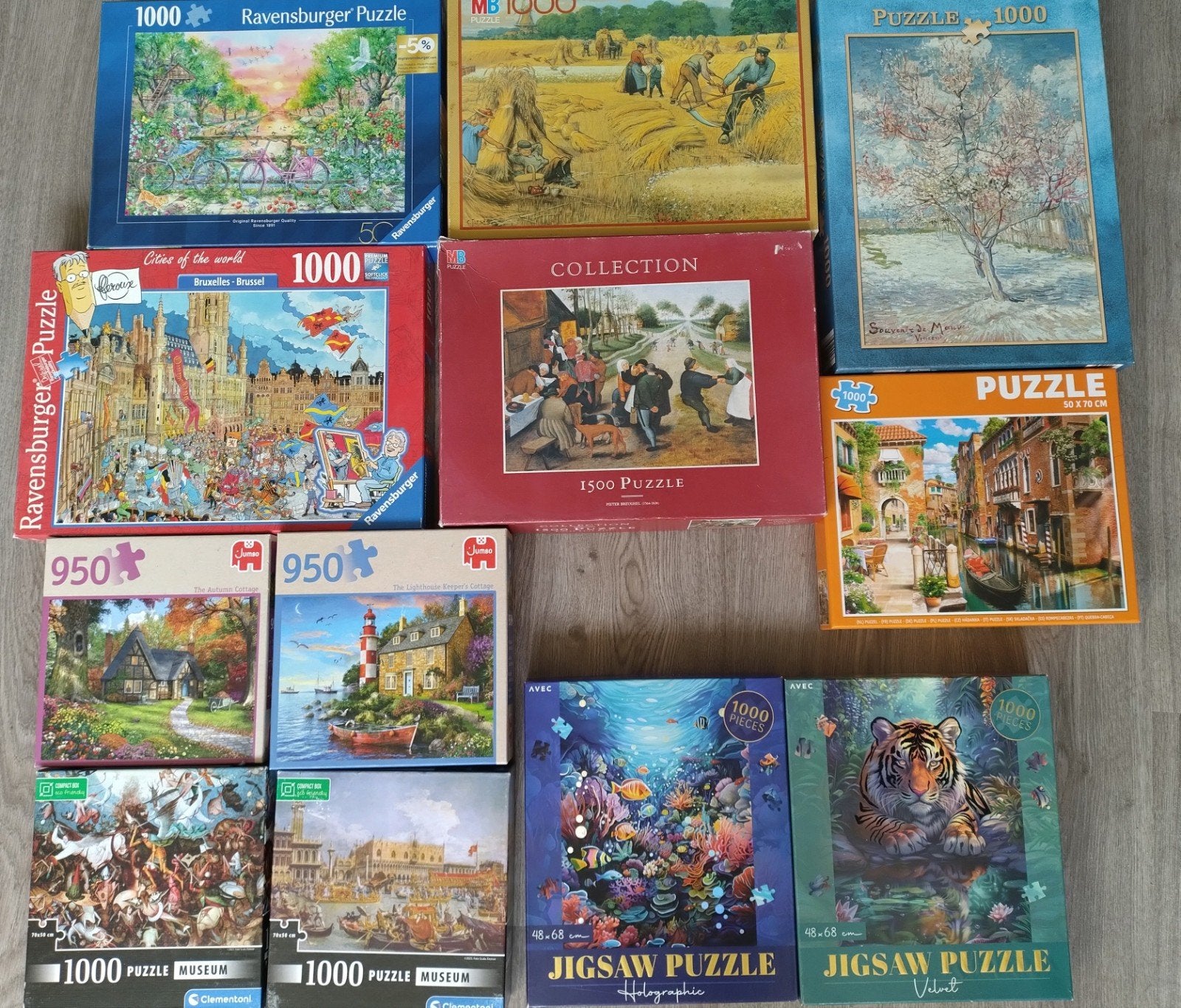 12 puzzels 950 - 1500 stukjes, Ophalen of Verzenden, 500 t/m 1500 stukjes, Gebruikt, Legpuzzel