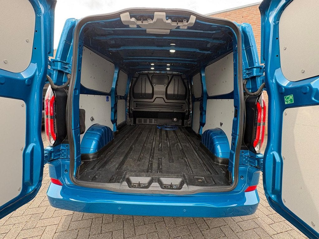 Ford E-Transit Custom 340 Lang 218PK Limited / 2.300KG Trekh, Auto's, Bestelauto's, Automaat, Gebruikt, Met garantie (alle), Blauw