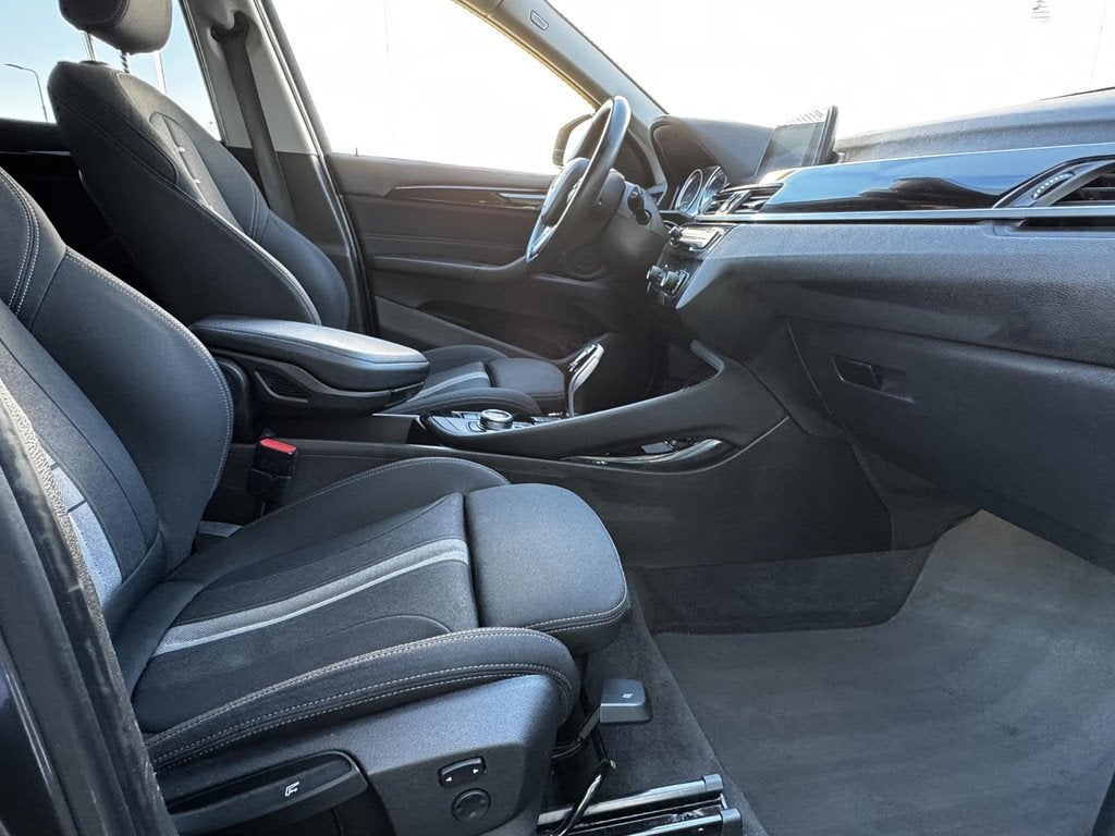 BMW X1 sDrive20i Executive, Auto's, Stof, Euro 6, Bedrijf, SUV of Terreinwagen