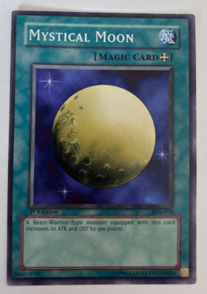 Yu-Gi-Oh! Mystical Moon LOB-094 1st Edition, Ophalen of Verzenden, Gebruikt, Losse kaart