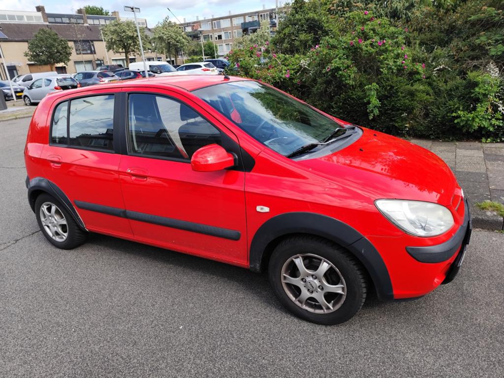 Hyundai Getz LPG zuinig en goed 1.4 5DRS 2008 Rood, Auto's, Voorwielaandrijving, 450 kg, 40 €/maand, 4 cilinders